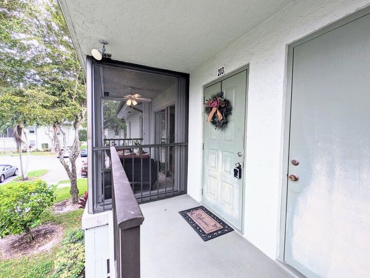 Property Photo:  7515 S Oriole Boulevard 203  FL 33446 