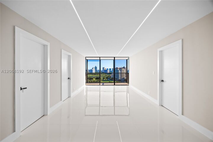 Property Photo: 20379 W Country Club Dr 1938 FL 33180