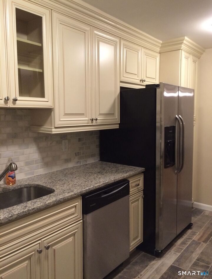 Property Photo: 20 North Street 1-1 CT 06902