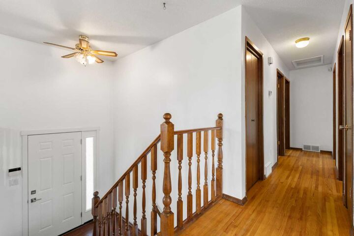 Property Photo: 6008 Dalgetty Drive NW AB T3A 1J3