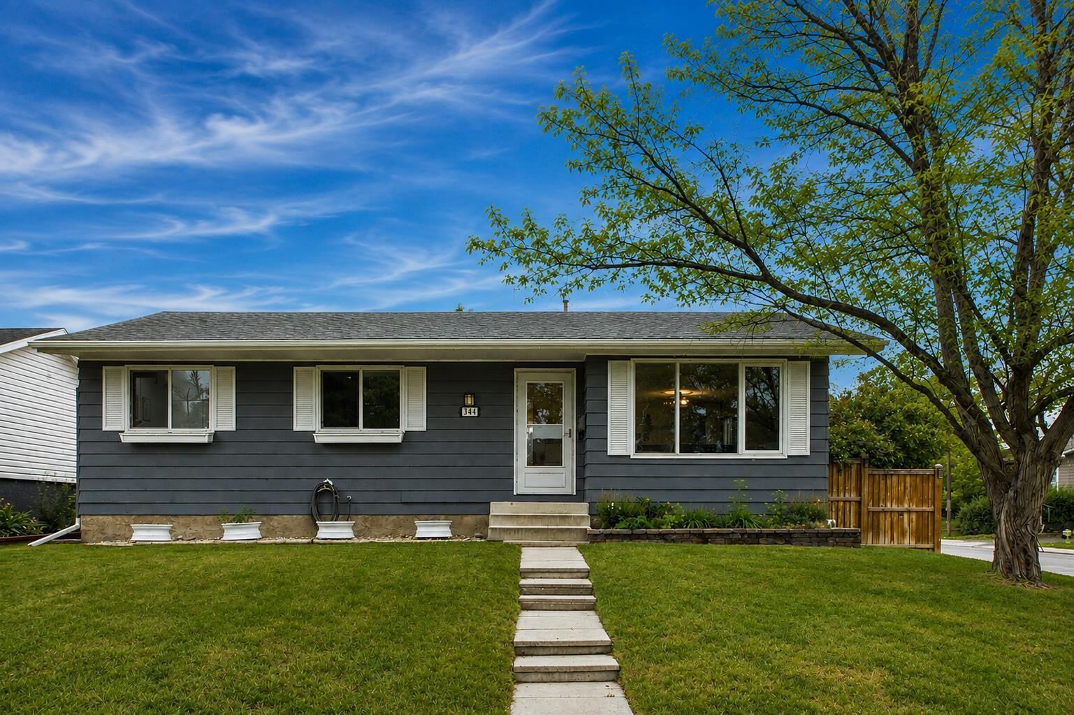 Property Photo: 344 Queen Charlotte Road SE AB T2J 4H6