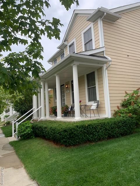 Property Photo:  830 Constitution Street  MI 48188 