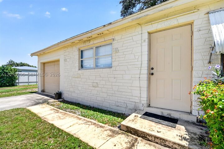 Property Photo:  1572 Woodland Ave  FL 33415 