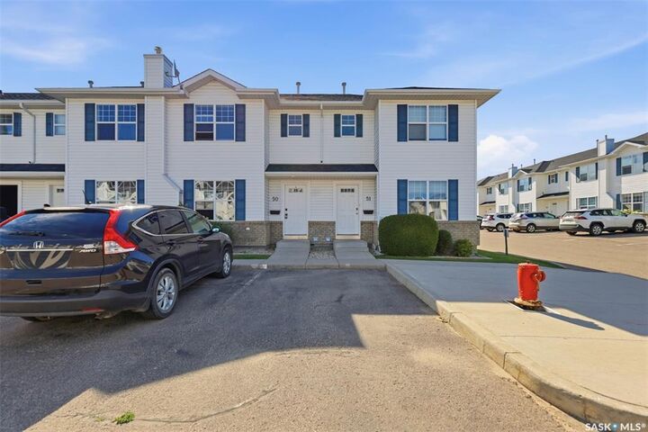 Property Photo: 203 Herold Terrace 50 SK S7V 1H8