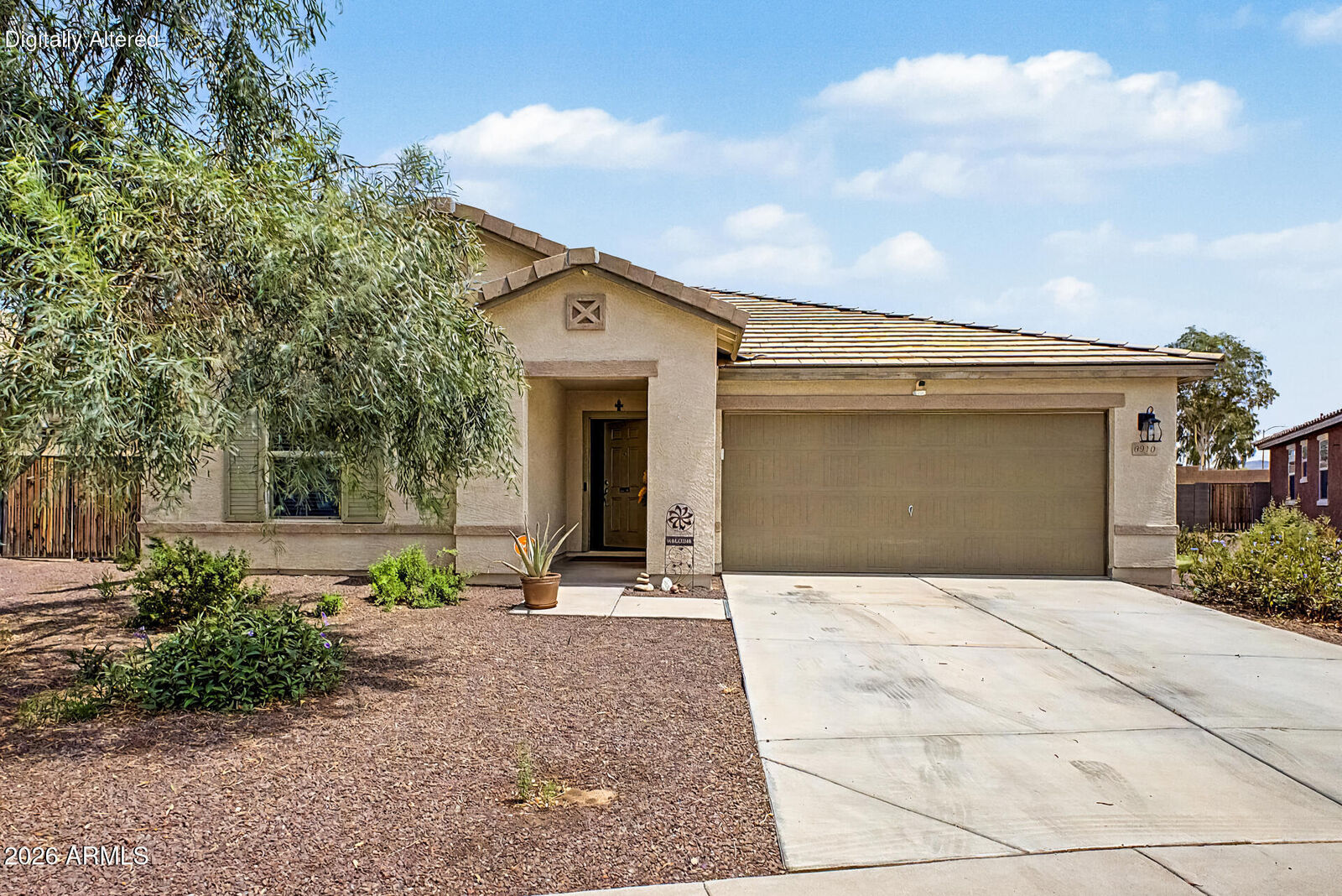 Property Photo: 6910 S 75th Drive AZ 85339