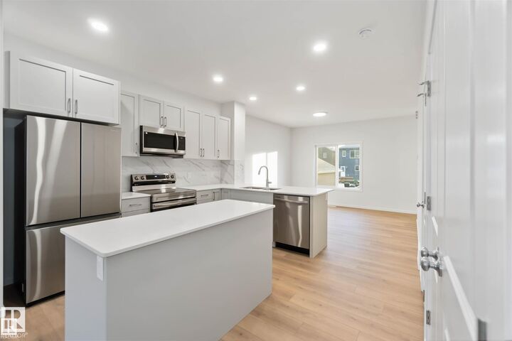 Property Photo: 2491 Alces Link SW AB T6X 1A7