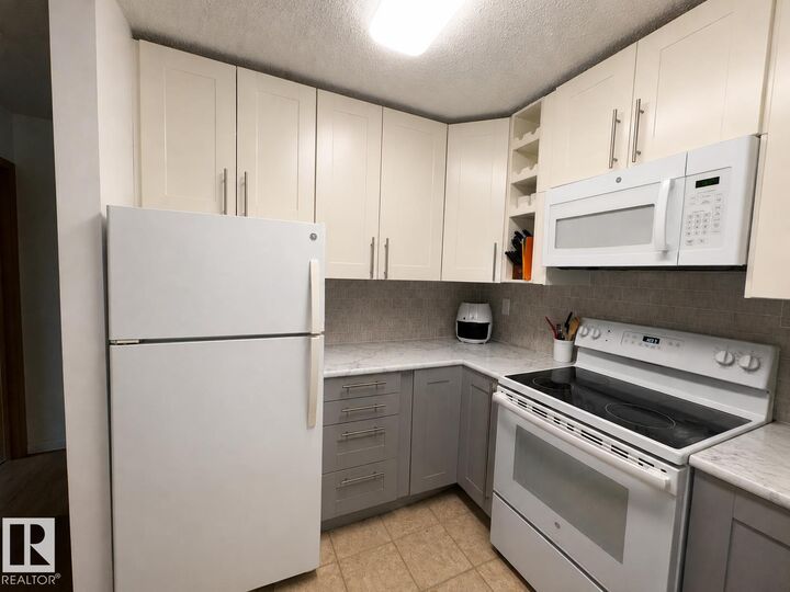 Property Photo: 44 Alpine Place 302 AB T8N 3Y2