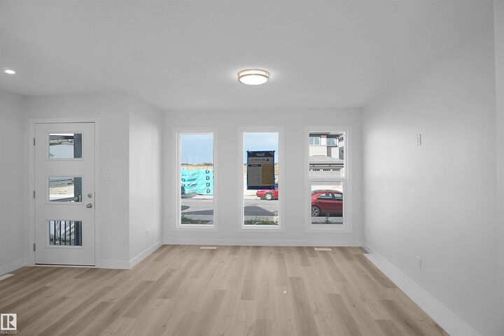 Property Photo:  21223 25 Avenue NW  AB T5Y 4G2 