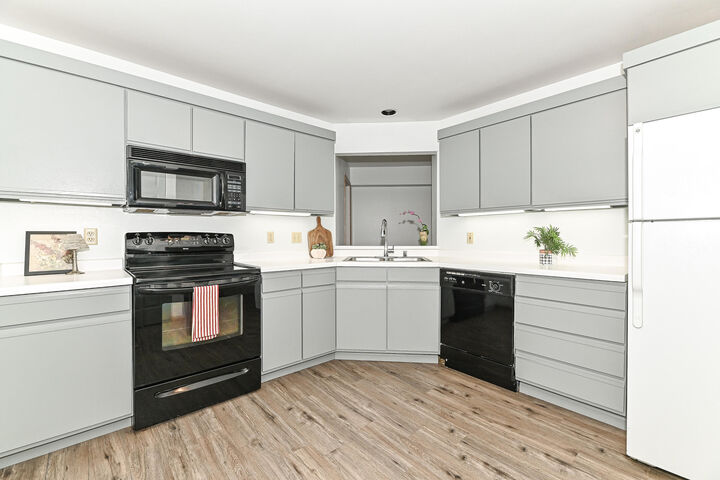 Property Photo:  1600 W Green Tree Rd  WI 53209 