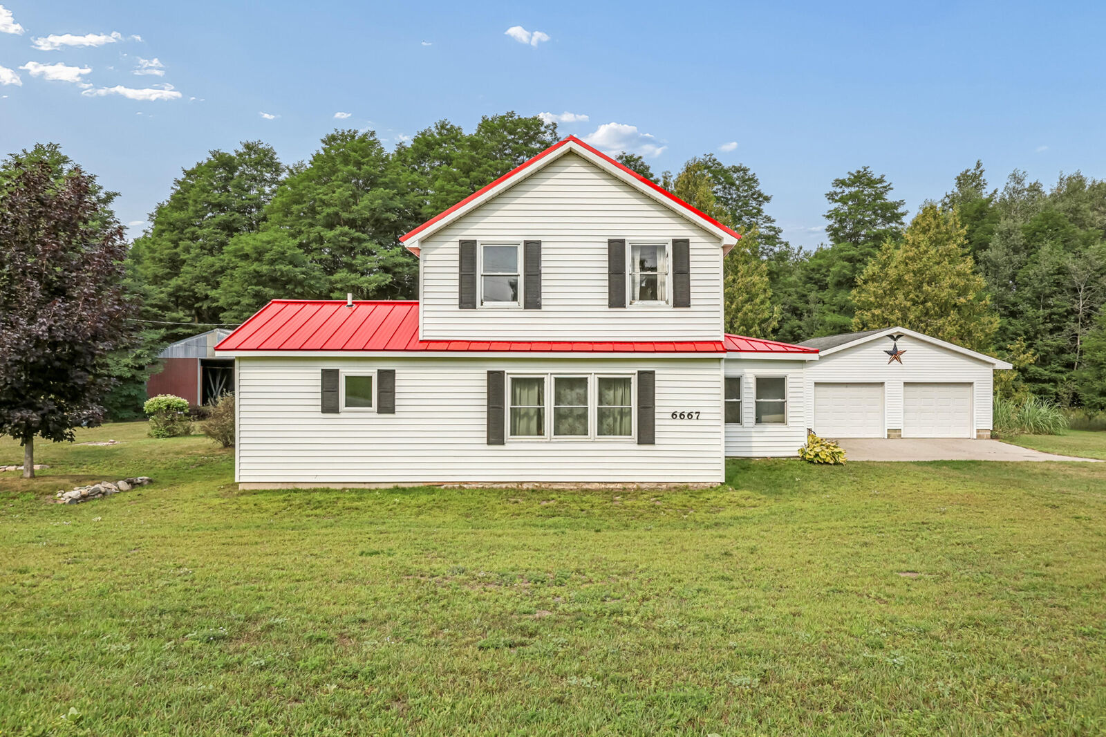 Property Photo: 6667 N 126th Avenue MI 49420