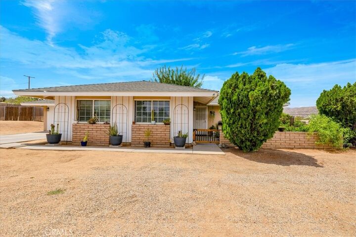 Property Photo:  7562 Acoma Trail  CA 92284 
