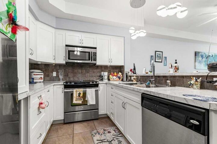 Property Photo: 100 Lakeway Boulevard 107 AB T4S 0A4