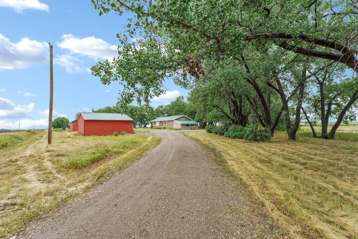 Property Photo: 12417 Range Road 71 AB T1A 7E5