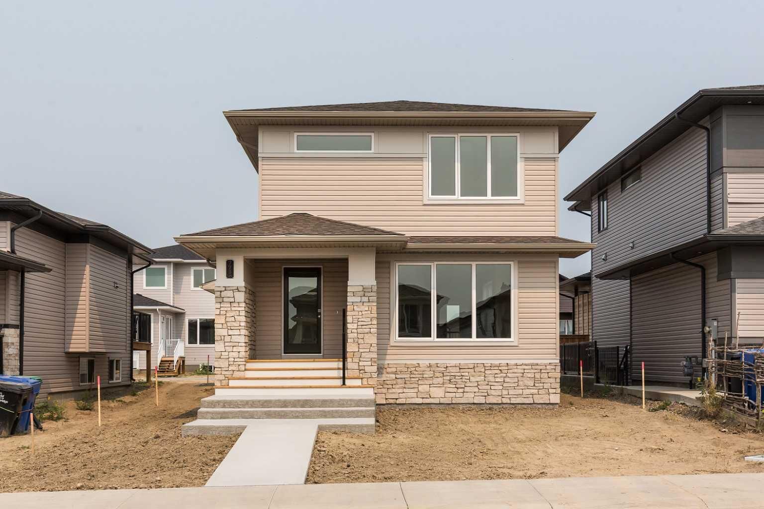 Property Photo: 773 Riverhills Landing W AB T1K 8H8