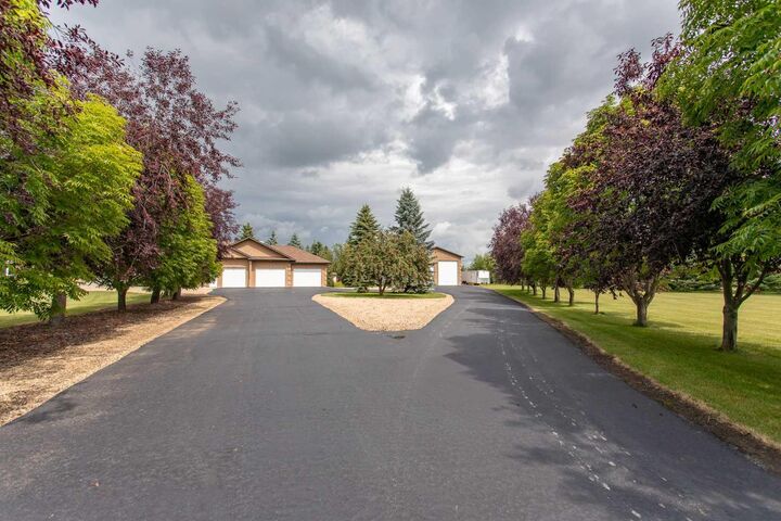 Property Photo: 261066 Township Road 422 AB T4J 1R3