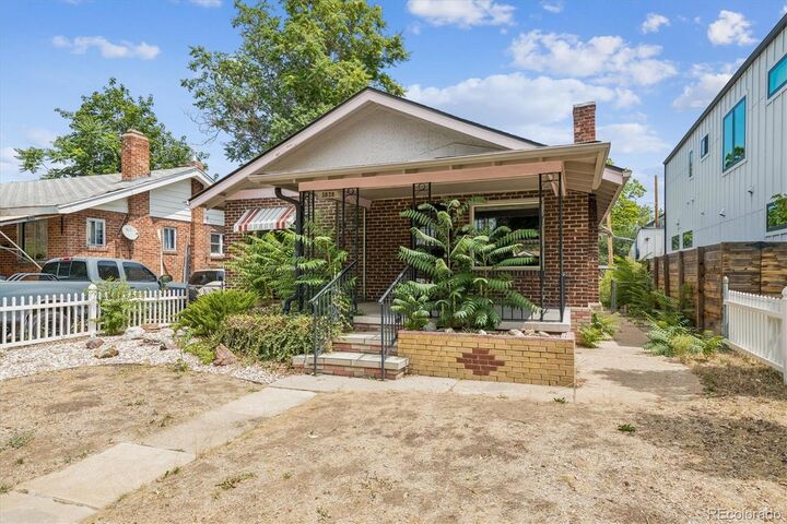 Property Photo: 3828 Wyandot Street CO 80211