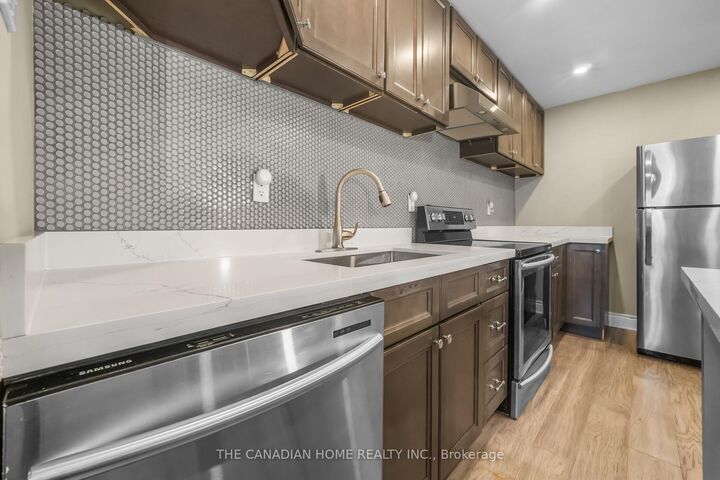 Property Photo: 4 Lisa Street 103 ON L6T 4B6