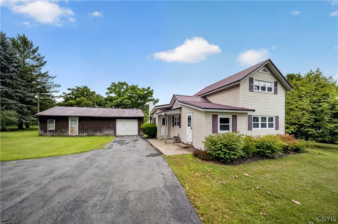 Property Photo: 1697 State Route 104A NY 13156