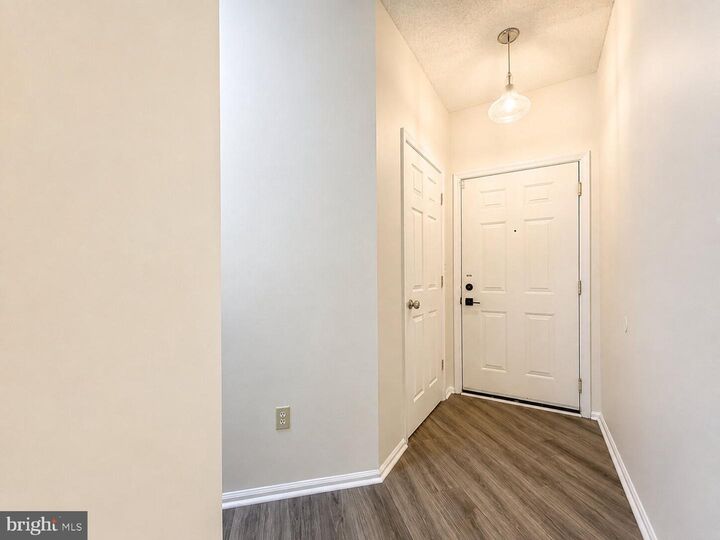 Property Photo:  14314 Climbing Rose Way 102  VA 20121 