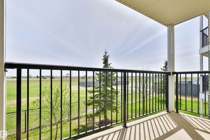 Property Photo: 6925 199 Street NW 213 AB T5T 3X8