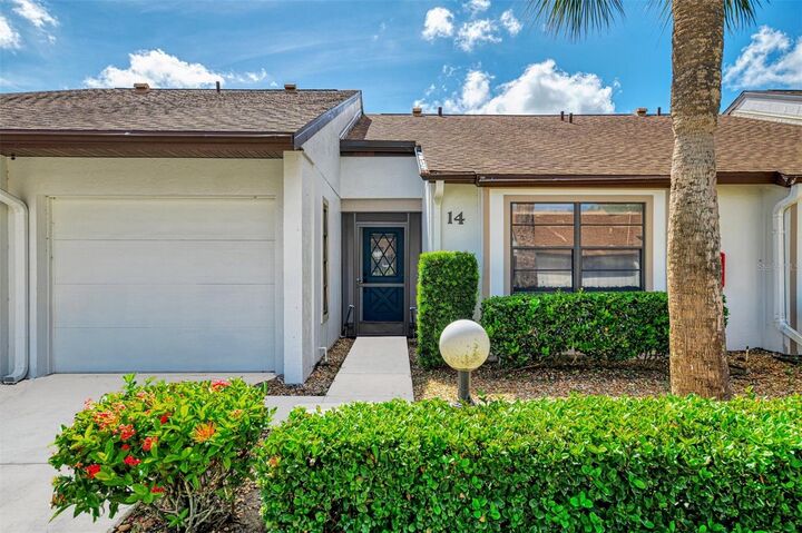 Property Photo: 1211 Capri Isles Boulevard 14 FL 34292