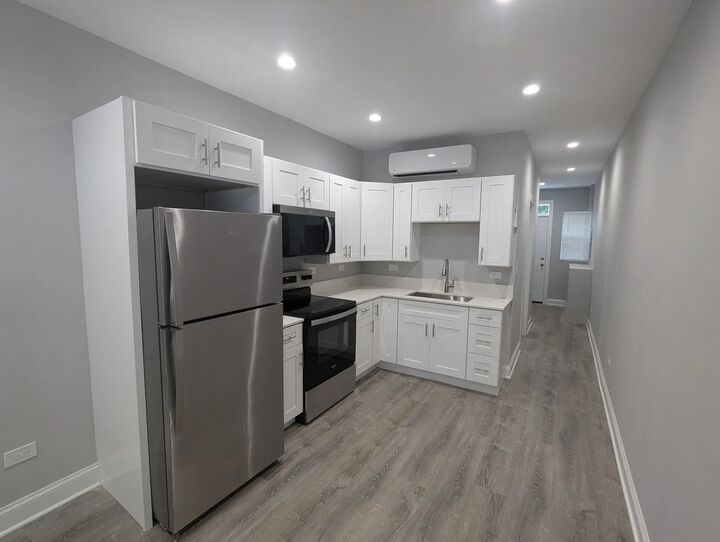 Property Photo: 7050 W Higgins Avenue 1E IL 60656