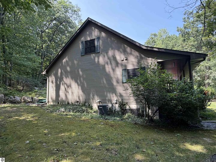 Property Photo:  722 Bungo Lake Road  MI 48625 
