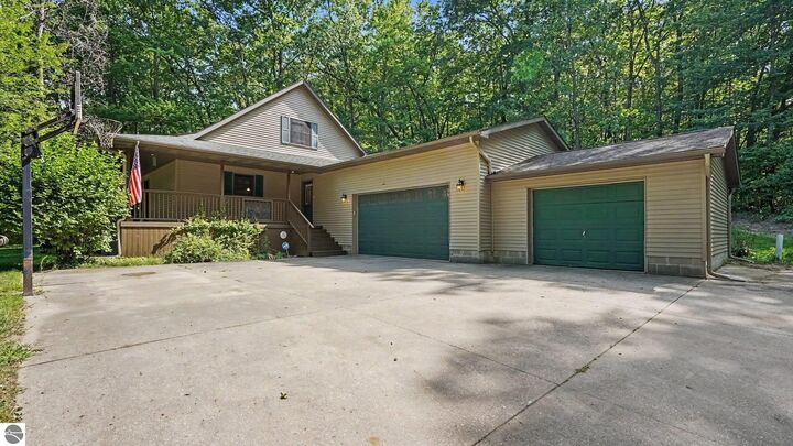 Property Photo:  722 Bungo Lake Road  MI 48625 