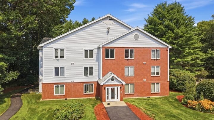 Property Photo:  1 Timberwood Dr 206  NH 03045 