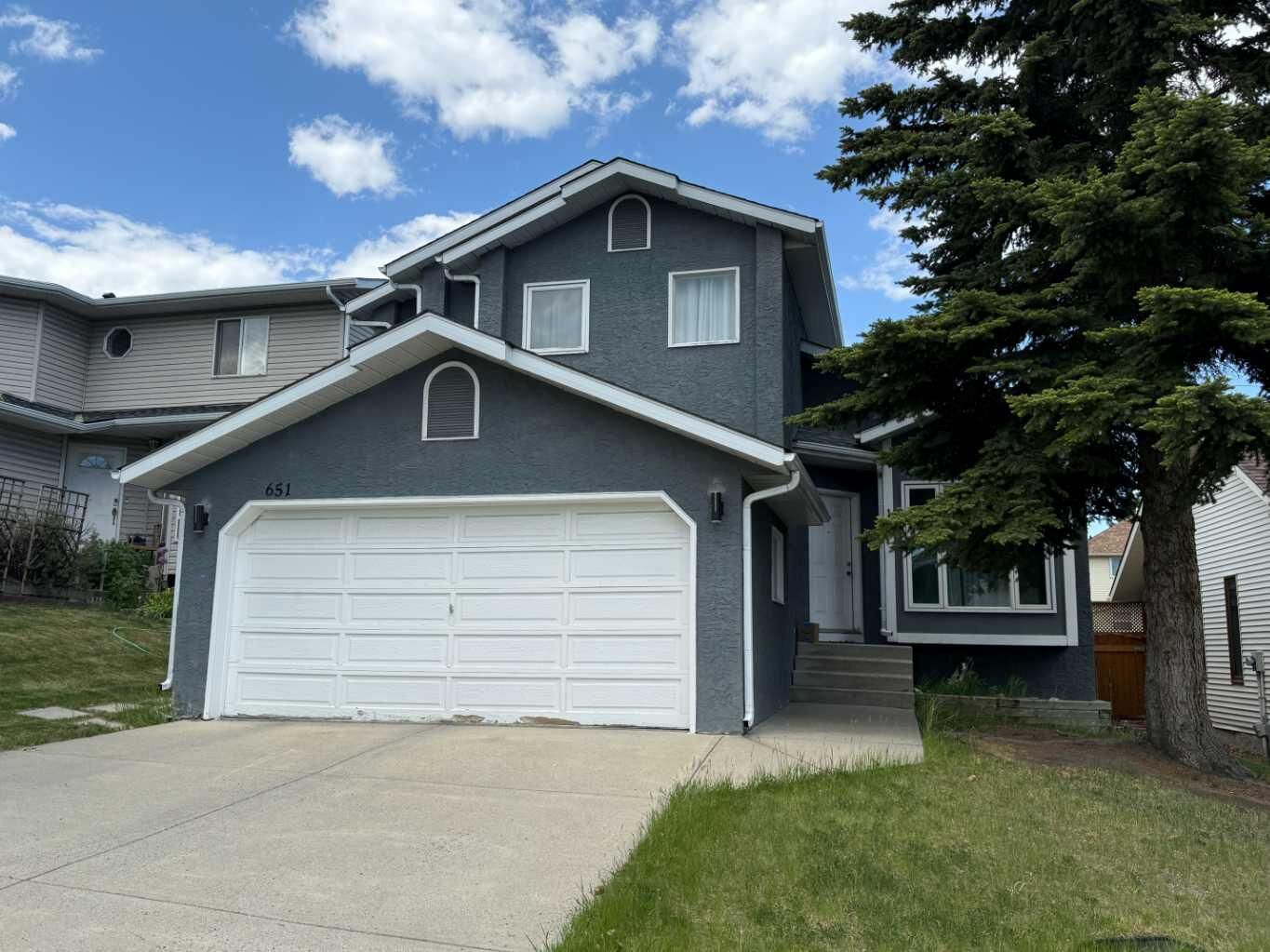 Property Photo: 651 Macewan Drive NW AB T3K 3R1