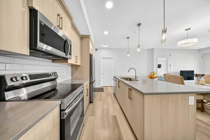 Property Photo:  220 Seton Grove SE 1211  AB T3M 3T1 