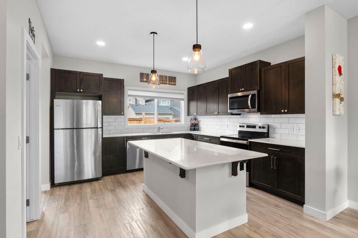 Property Photo: 115 Wolf Willow Boulevard SE AB T2X 3Z9