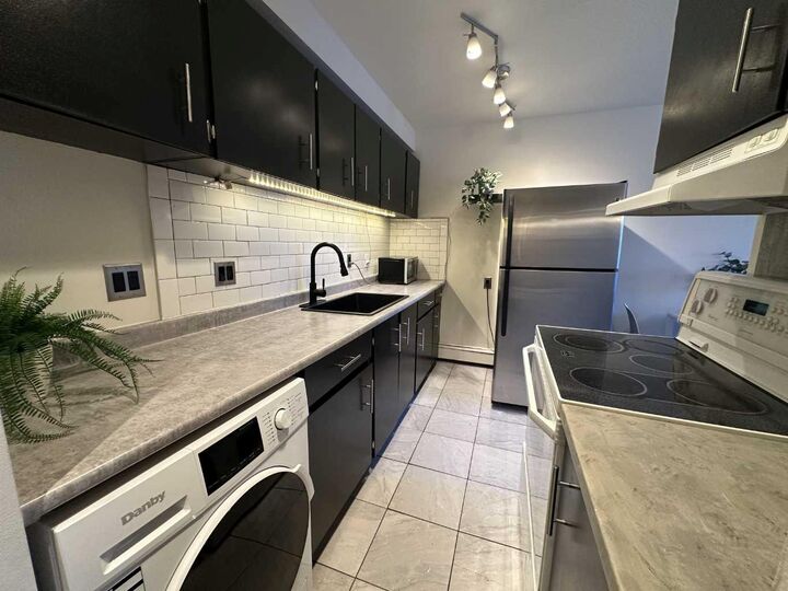 Property Photo:  1829 11 Avenue SW 206  AB T3C 0N2 