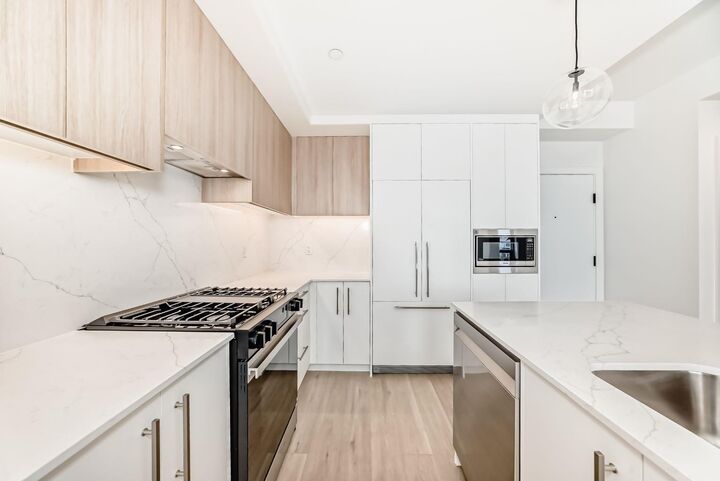 Property Photo: 8375 Broadcast Avenue SW 415 AB T3H 6L3