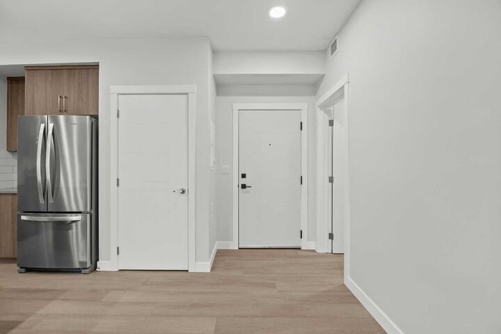 Property Photo: 100 Banister Drive 3301 AB T1S 5Y4