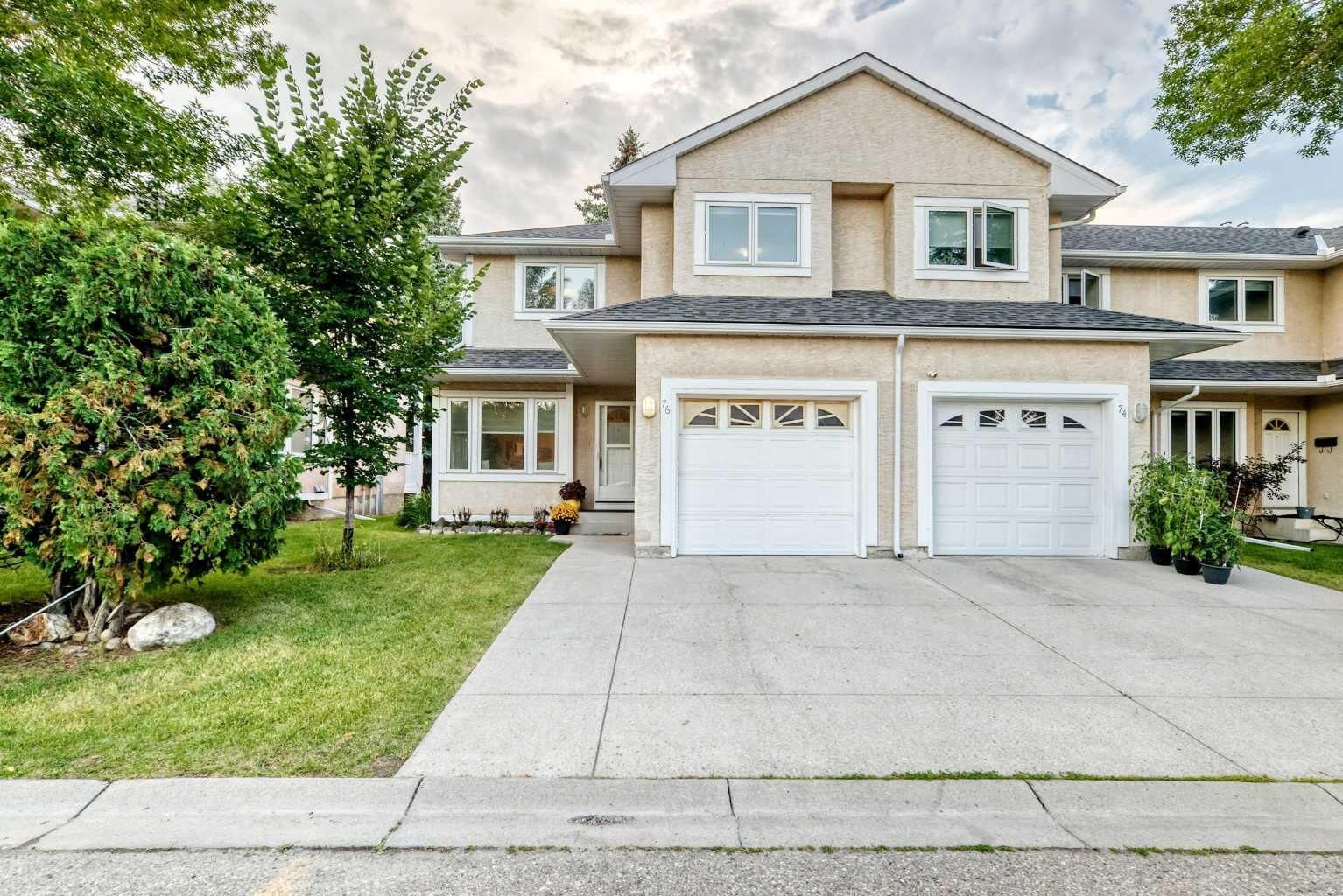 Property Photo:  388 Sandarac Drive NW 76  AB T3K 4E3 