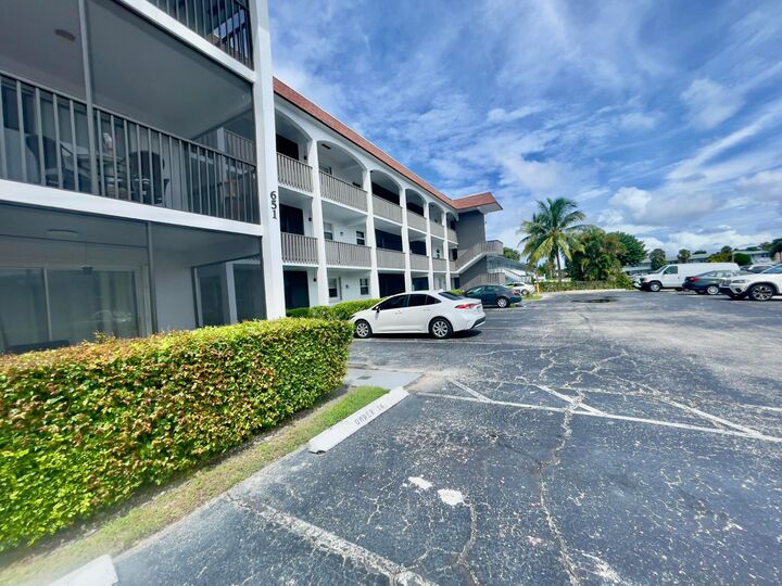 Property Photo: 651 Pine Drive 207 FL 33060