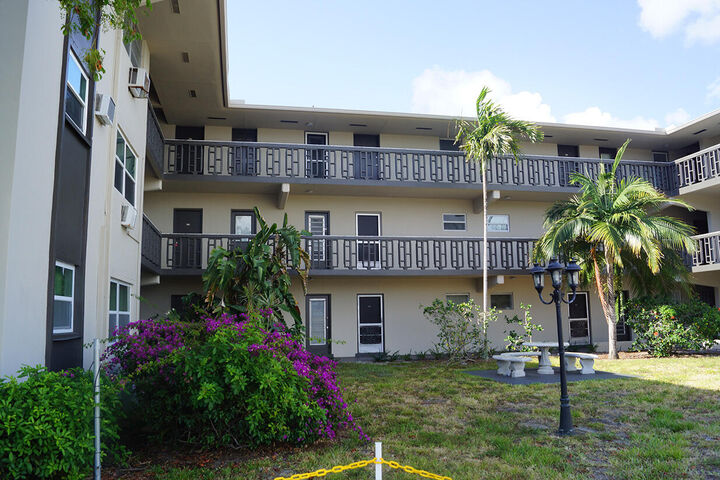 Property Photo: 1250 E Sample Road 303 FL 33064