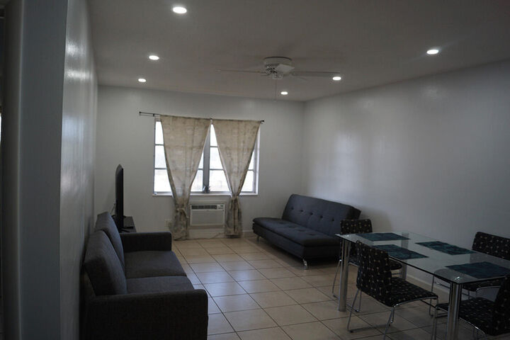 Property Photo:  1250 E Sample Road 303  FL 33064 