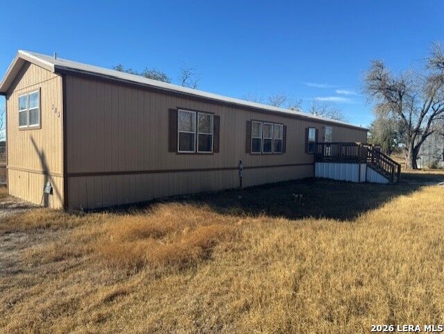 Property Photo: 385 W County Road 5719 TX 78016