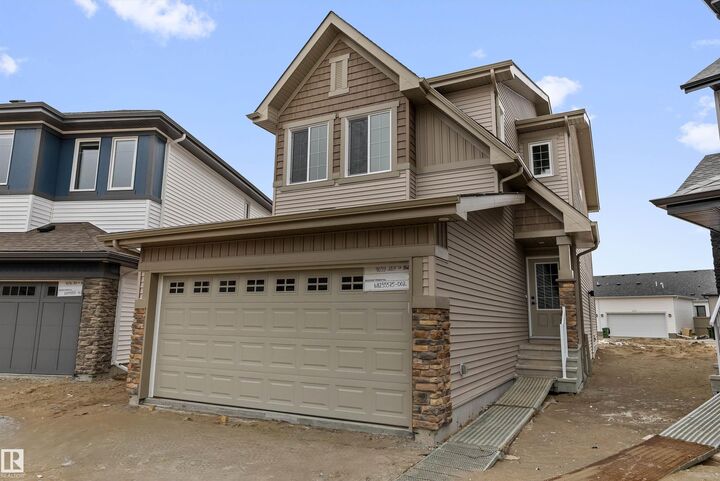 Property Photo:  4039 207 Street NW  AB T6M 3G1 