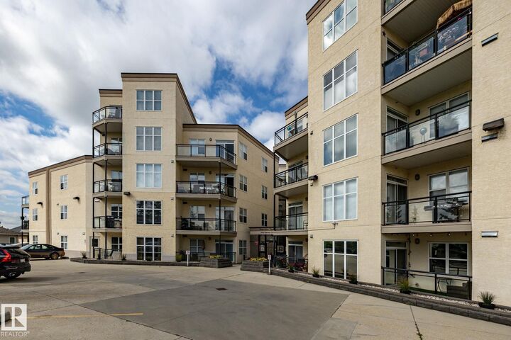 Property Photo: 9940 Sherridon Drive 305 AB T8L 4C9