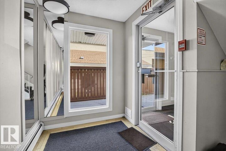 Property Photo:  11429 124 Street NW 205  AB T5M 0K4 