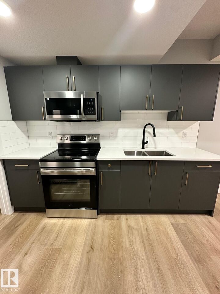 Property Photo:  3922 40 Avenue Bsmt  AB T4X 3B6 