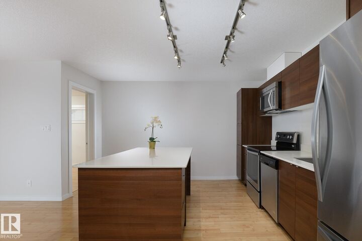 Property Photo:  9523 160 Avenue NW 110  AB T5Z 0N1 