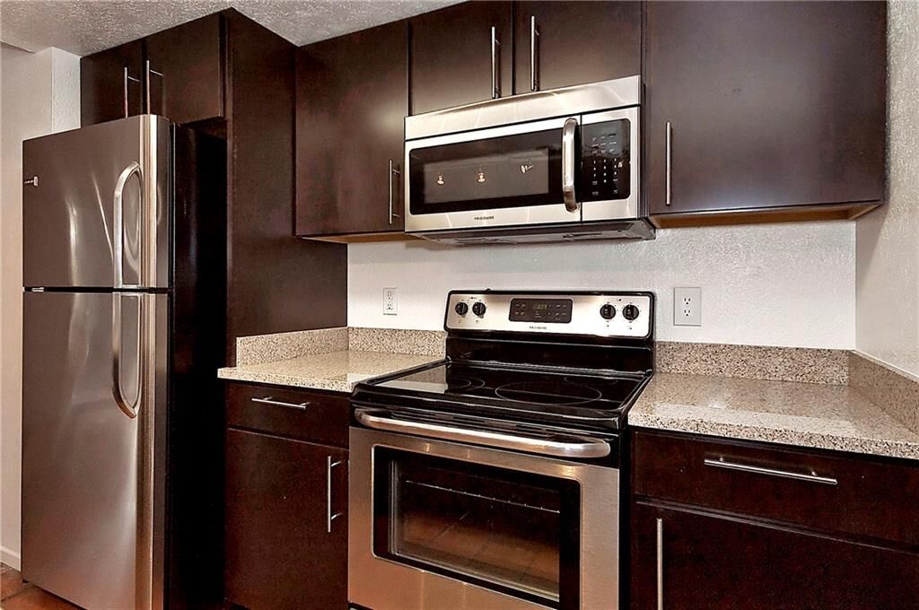 Property Photo: 5909 Birchbrook Drive 129 TX 75206