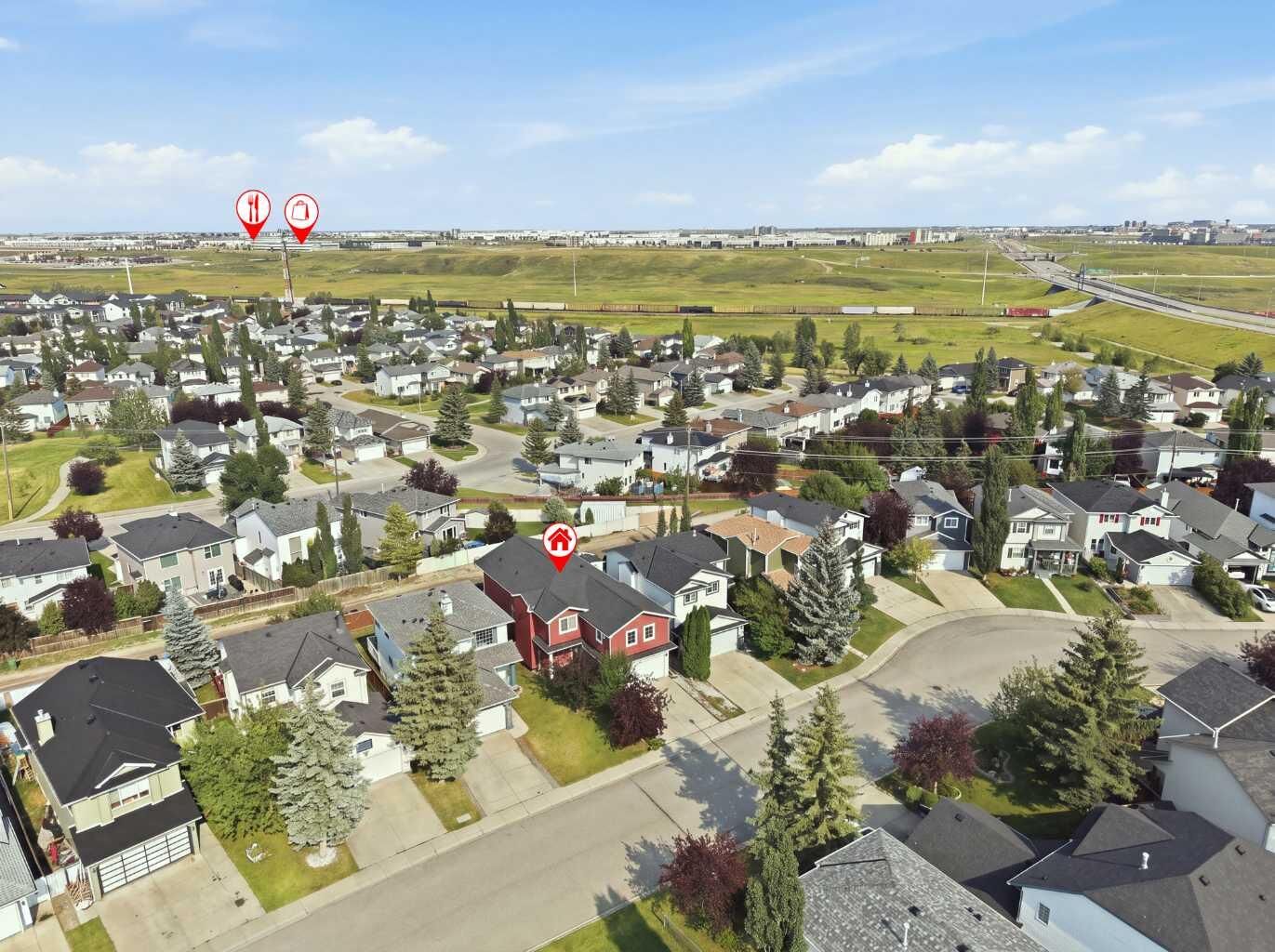 Property Photo: 167 Harvest Glen Way NE AB T3K 4J4