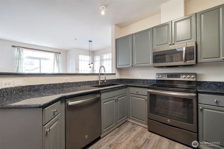 Property Photo:  17656  134th Lane SE F17656  WA 98058 