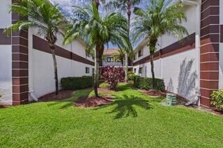 Property Photo:  15451 Pembridge Drive 203  FL 33484 