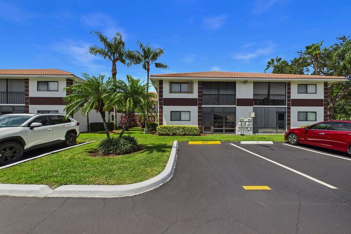 Property Photo:  15451 Pembridge Drive 203  FL 33484 